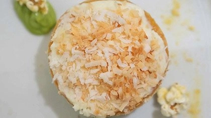 Coconut Cake dessert at the CIA's Savor restaurant in the Pearl District of San Antonio, Texas.