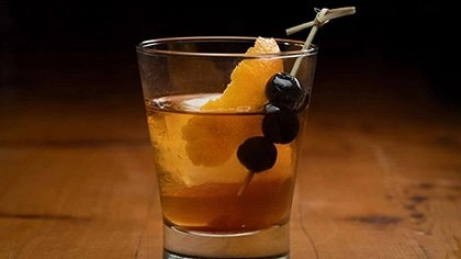Old Fashioned cocktail, served at Savor restaurant on the campus of The Culinary Institute of America in the Pearl District of San Antonio, Texas.