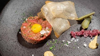 Steak Tartare with Chipotle at the CIA's Savor restaurant in the Pearl District of San Antonio, Texas.